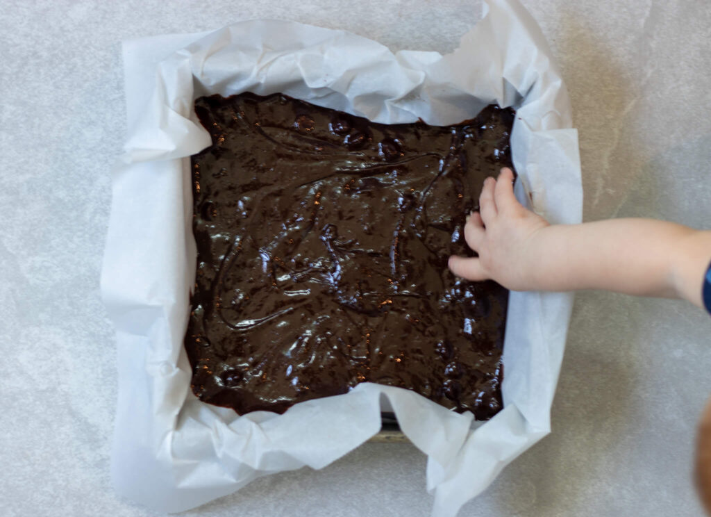 brownie batter in a pan