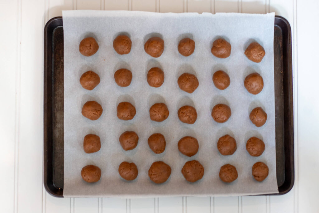 cookie butter truffles on a sheet pan