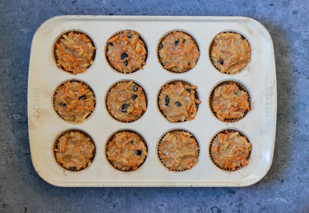 muffin tin filled with muffin batter