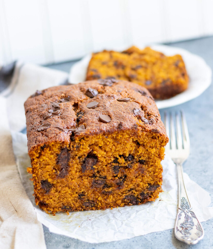 whole wheat pumpkin bread with a fork and a slice cut