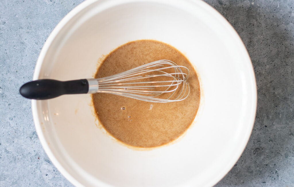 batter mixed together for pecan pie bars