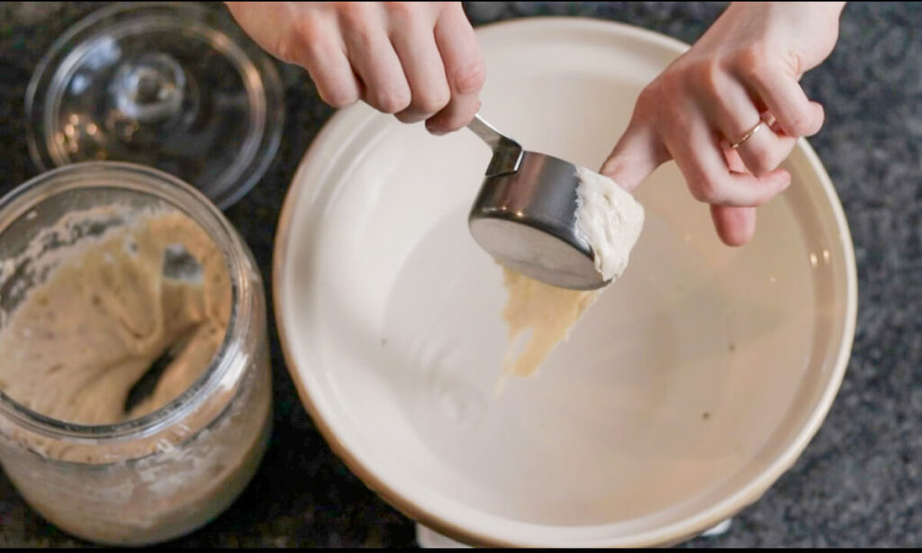 pouring starter in water